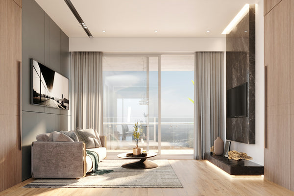 Modern living room with large window and ocean view