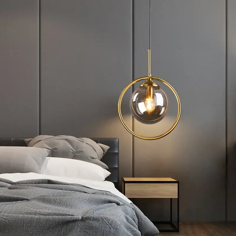 Modern Glass Ball Pendant Lighting Fixture with Golden Ring - Stylish Luminaire for Various Spaces