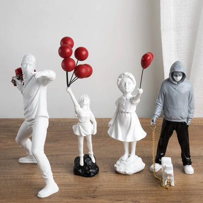 Banksy Sculpture Set – Flower Thrower & Balloon Girl Resin Decor for Home & Office