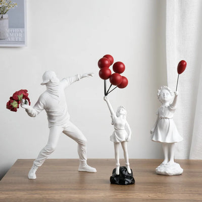 Banksy Sculpture Set – Flower Thrower & Balloon Girl Resin Decor for Home & Office